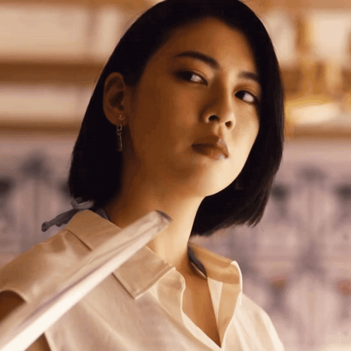 Woman's Face in White Shirt