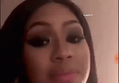 Woman's Face With Black Eye Shadow