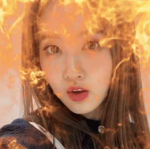 Woman's Face With Fire Hair GIF