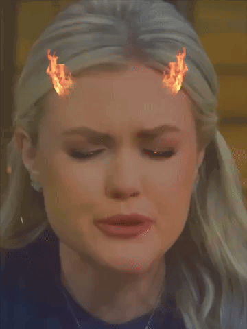 Woman's Face With Flames From Eyes GIF