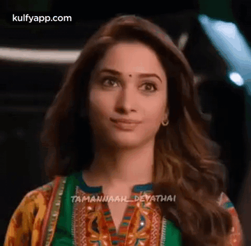 Woman's Face With Green Shirt GIF