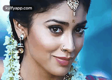 Woman's Face With Nose Ring and Earrings