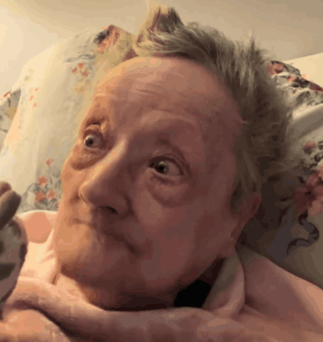 Woman's Face with Pink Blanket