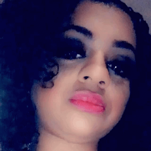 Woman's Face With Pink Lips GIF