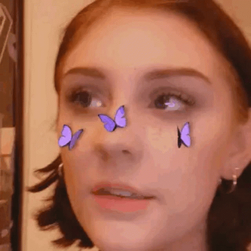 Woman's Face with Purple Butterflies