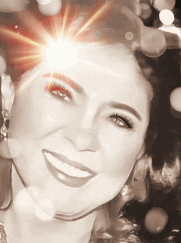 Woman's Face With Sun Through Eyes