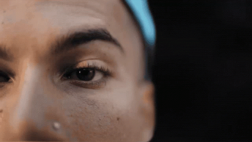 Woman's Face With Tear On Nose GIF