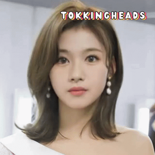 Woman's Face With Tokingheads GIF