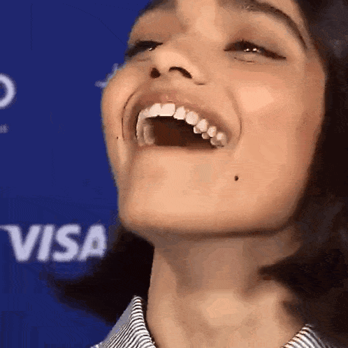 Woman's Face With Visa Background GIF