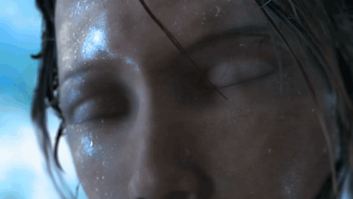 Woman's Face With Water Drops GIF