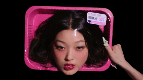 Woman's Head in Pink Container