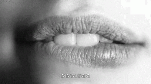 Woman's Lips With Mmmm Text