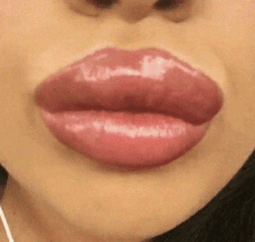 Woman's Lips With Red Lipstick