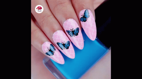 Woman's Pink Nails With Blue Butterflies and Nail Polish
