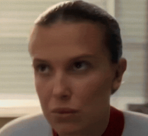 Woman's Serious Face Close Up GIF