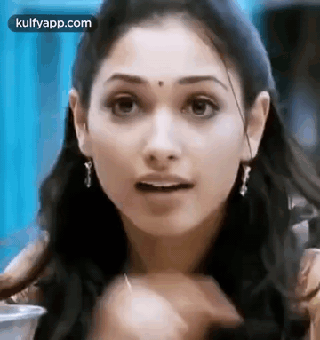 Woman's Surprised Face Close Up GIF
