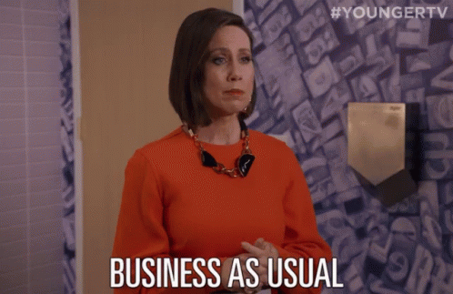 Woman Saying Business as Usual in Bathroom