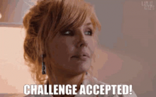 Woman Saying Challenge Accepted Looking At Camera GIF