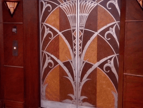 Woman Saying Enjoy The Day In Front Of Door GIF