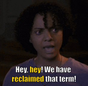 Woman Saying Hey Hey in Yellow Letters