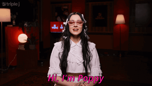 Woman Saying Hi I'm Poppy