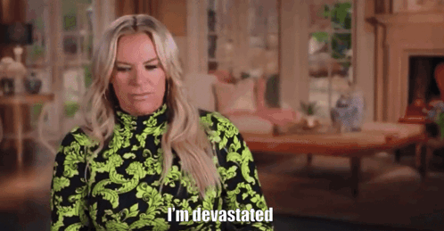 Woman Saying I Am Devastated in Front of Moonshine Ad