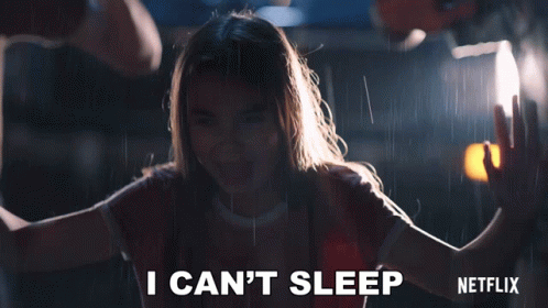 Woman Saying I Can't Sleep in Rain
