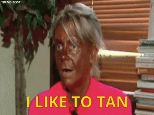 Woman Saying I Like to Tan