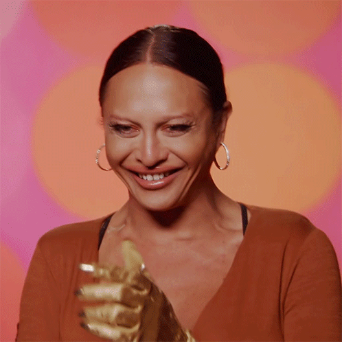 Woman Saying I Love It Holding Gold Glove