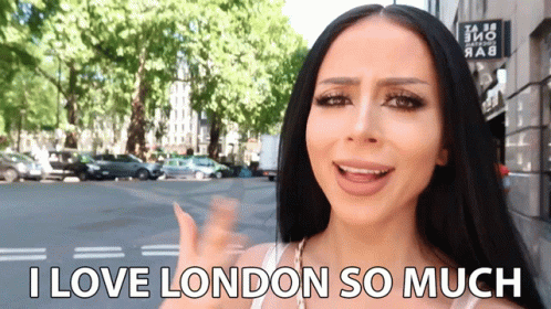 Woman Saying I Love London So Much In Front Of Building GIF