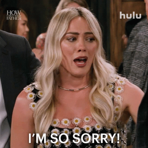 Woman Saying I'm So Sorry in Black Dress With Daisies