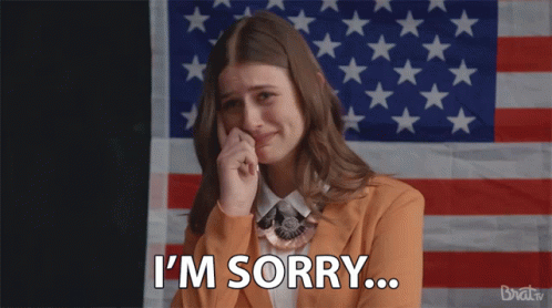 Woman Saying I'm Sorry With American Flag