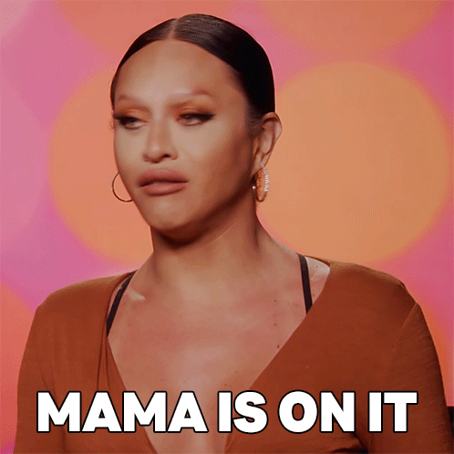 Woman Saying Mama in Front of Orange