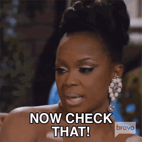 Woman Saying Now Check That In Dress And Earrings GIF