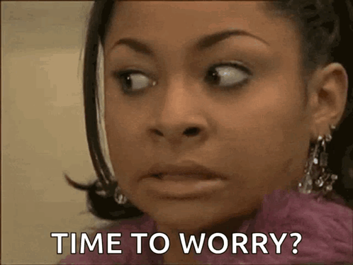 Woman Saying Time To Worry GIF