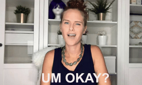 Woman Saying Um Okay in Front of Shelves