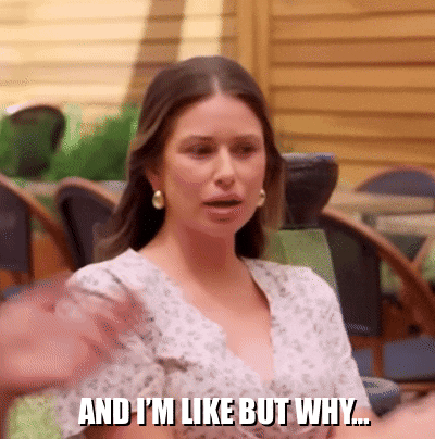 Woman Saying Why in Front of Restaurant
