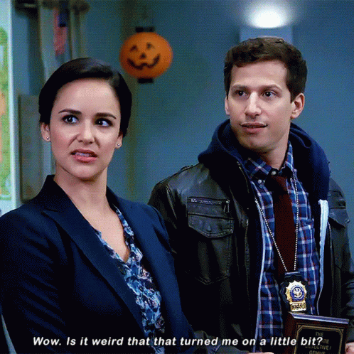 Woman Saying Wow Next To Man GIF