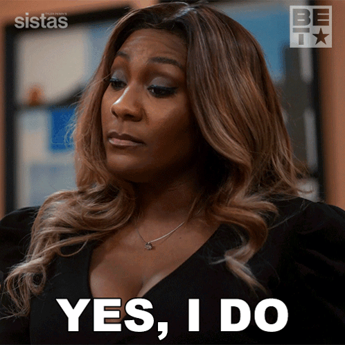 Woman Saying Yes In Front Of Sistas Sign GIF