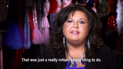 Woman Saying You Look Horrible Next to Dresses