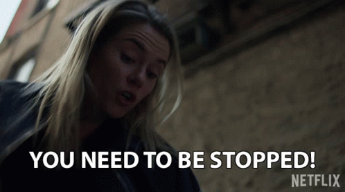 Woman Saying You Need to Be Stopped Outside Building