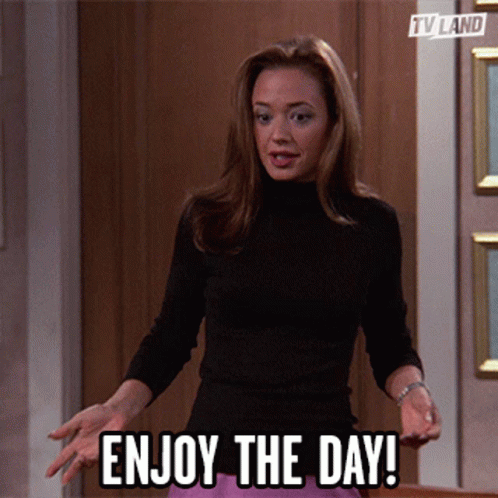 Woman Says Enjoy The Day In Front Of Door GIF