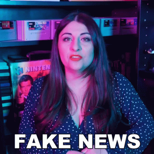 Woman Says Fake News in Front of Video Games