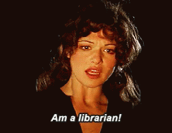 Woman Says I Am Librarian in Dark Room