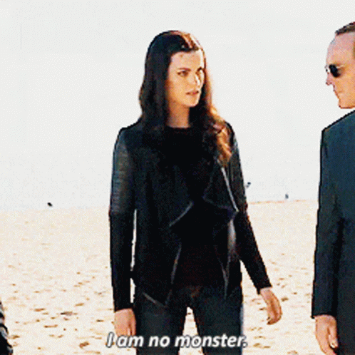 Woman Says I Am No Monster in Front of Man in Suit