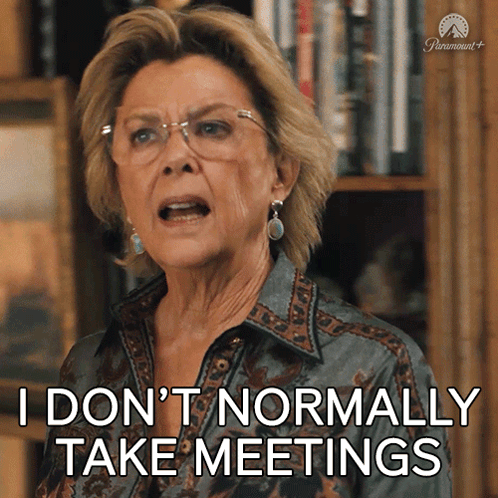 Woman Says I Don't Normally Take Meetings in Front of Bookshelf