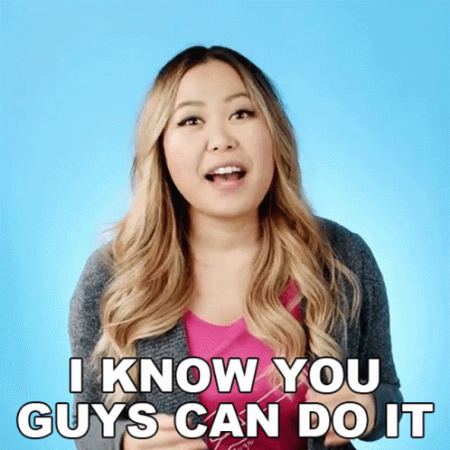 Woman Says I Know You Guys Can Do It in Front of Blue Background