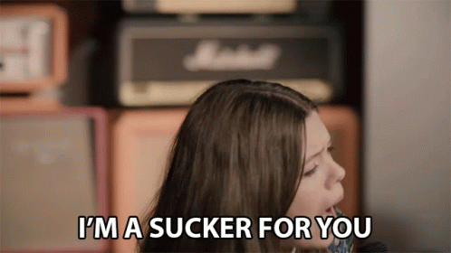 Woman Says I'm A Sucker For You In Front Of Marshall Amplifier GIF