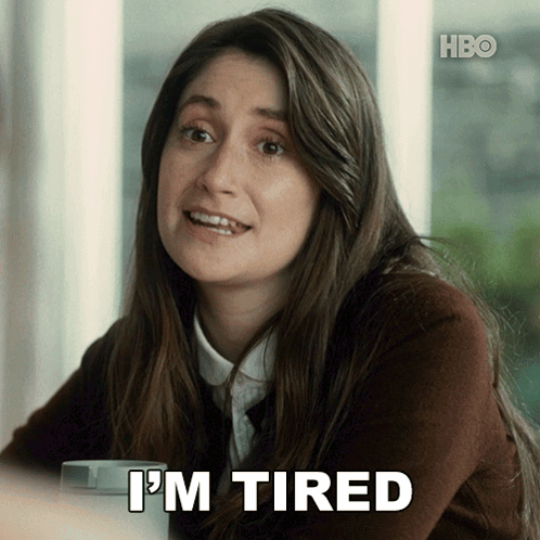 Woman Says I'm Tired in Front of Window