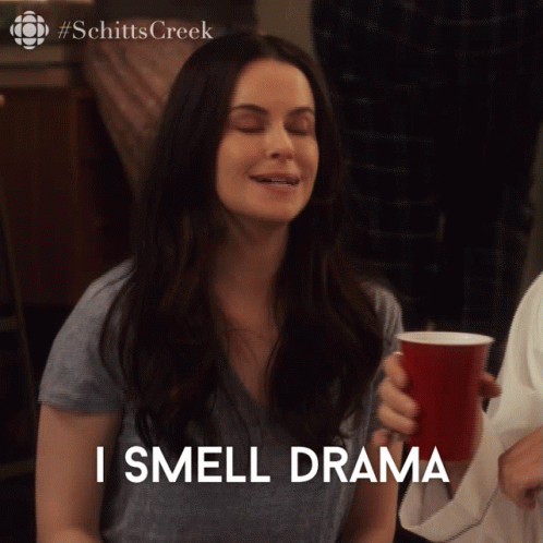 Woman Says I Smell Drama Holding Red Cup